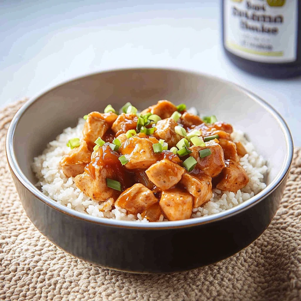 Close-up view of Sweet Hawaiian Crockpot Chicken with juicy chicken and tangy pineapple sauce.